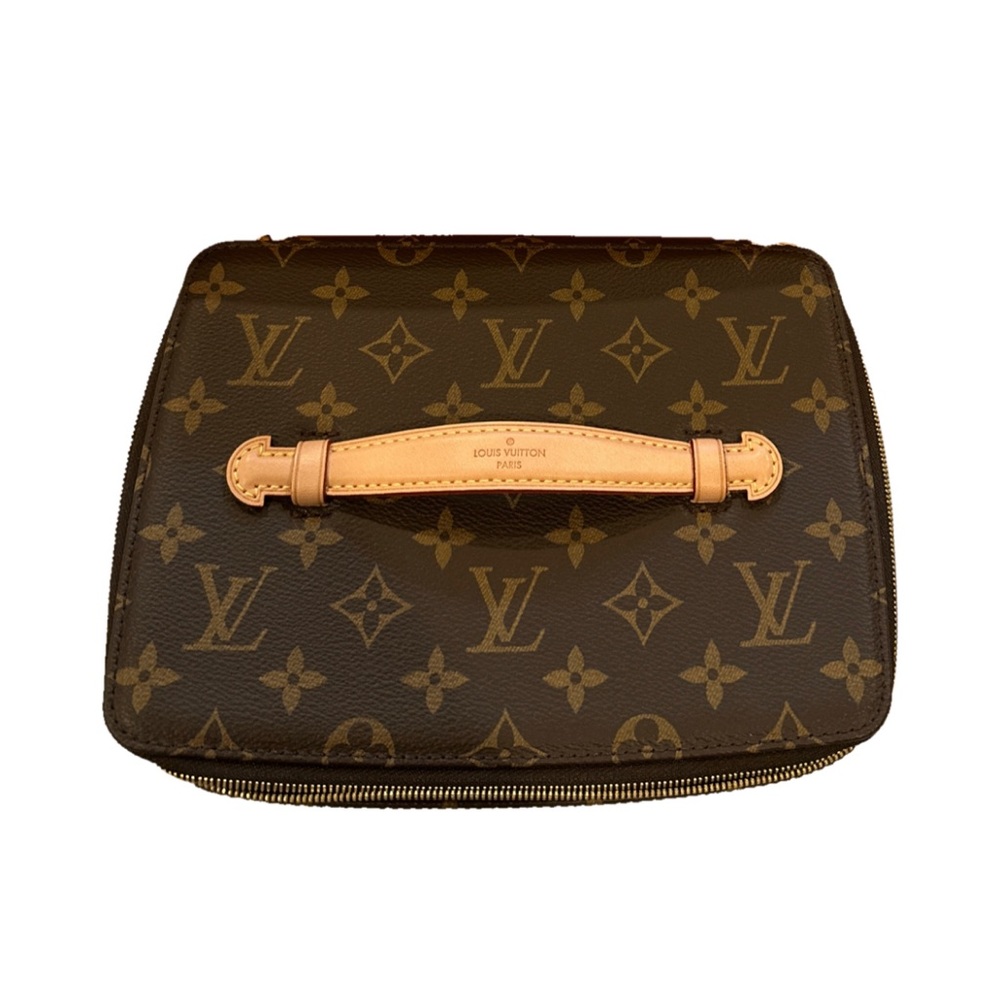 Brand new never used Louis Vuitton travel accessory case